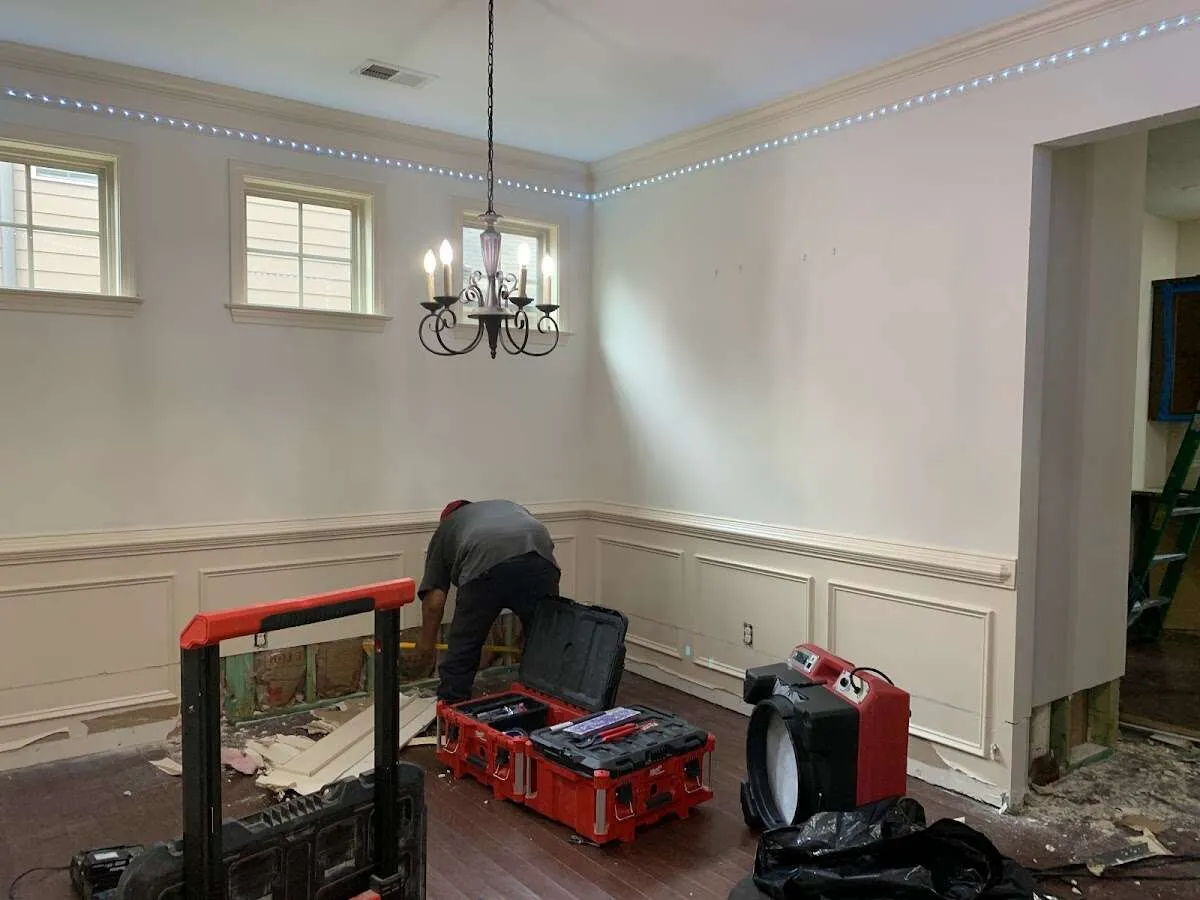 Restoration technician with professional equipment in Rocky Hill